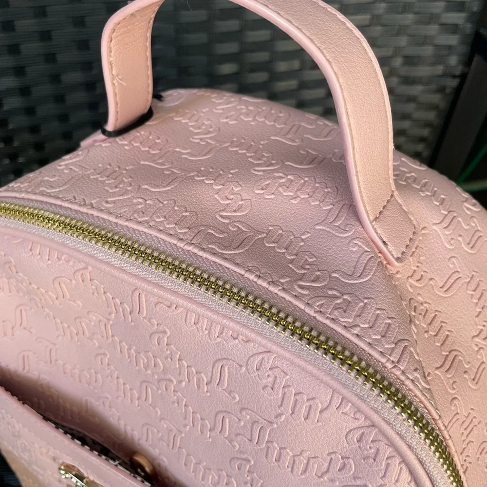 JUICY COUTURE,Juicy Couture Light Pink Backpack.